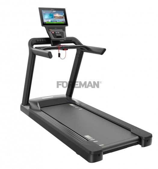 Компактная беговая дорожка PRECOR TRM 581 с консолью P84, тихой работой и технологиями амортизации Ground Effects